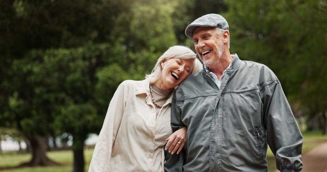 Retired couple walking in the park