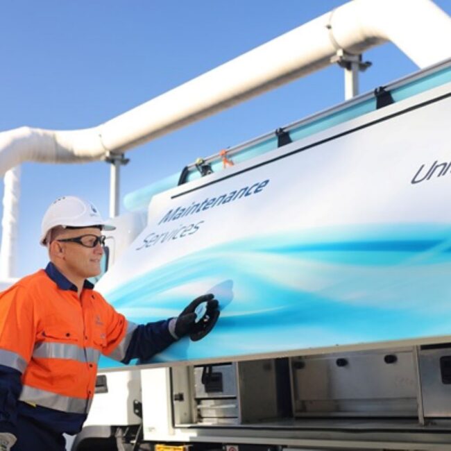 man standing in front of a Unitywater maintenance truck.