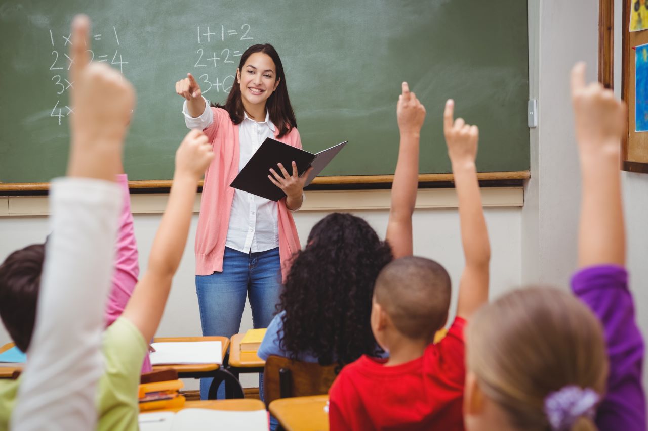 Teacher asking questions to class