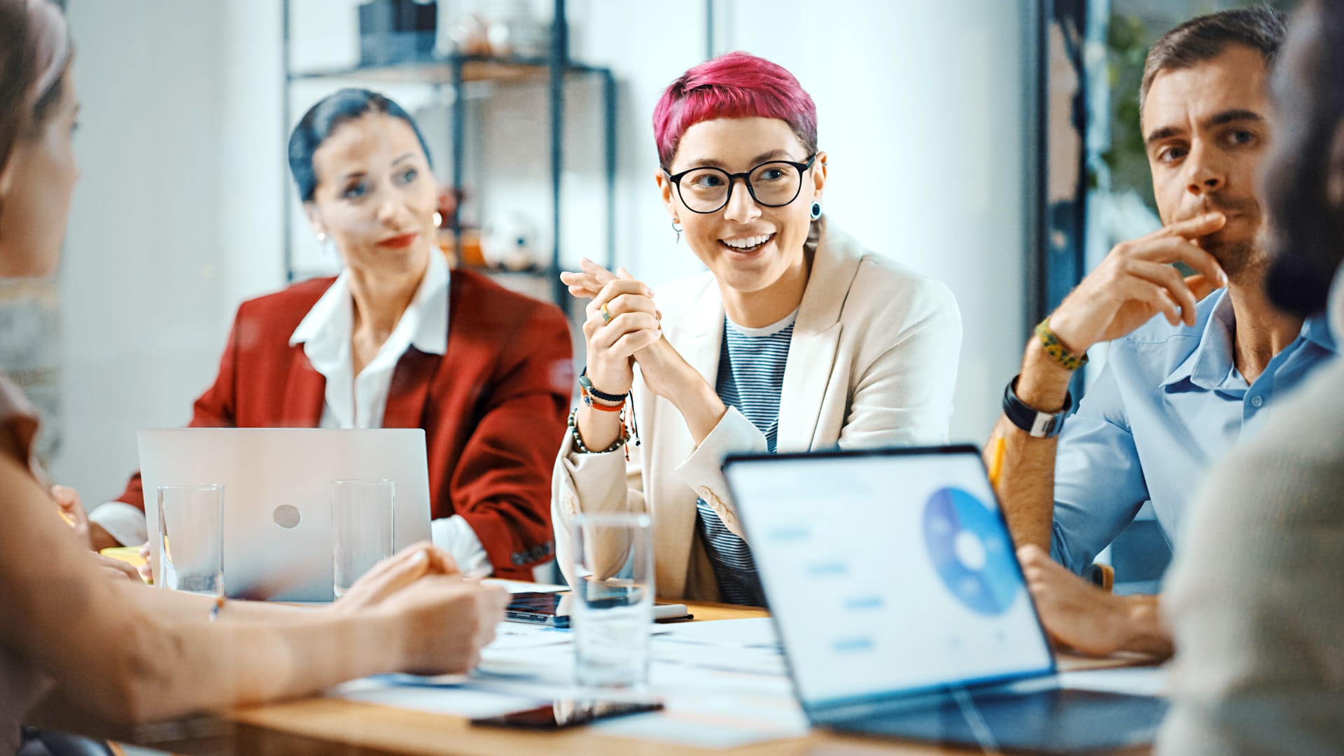 Staff collaborating in a meeting room