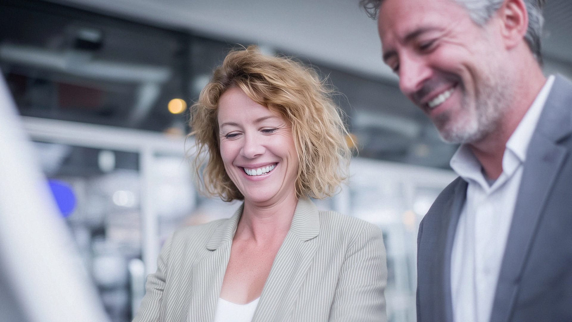 Woman and man discussing cloud strategy