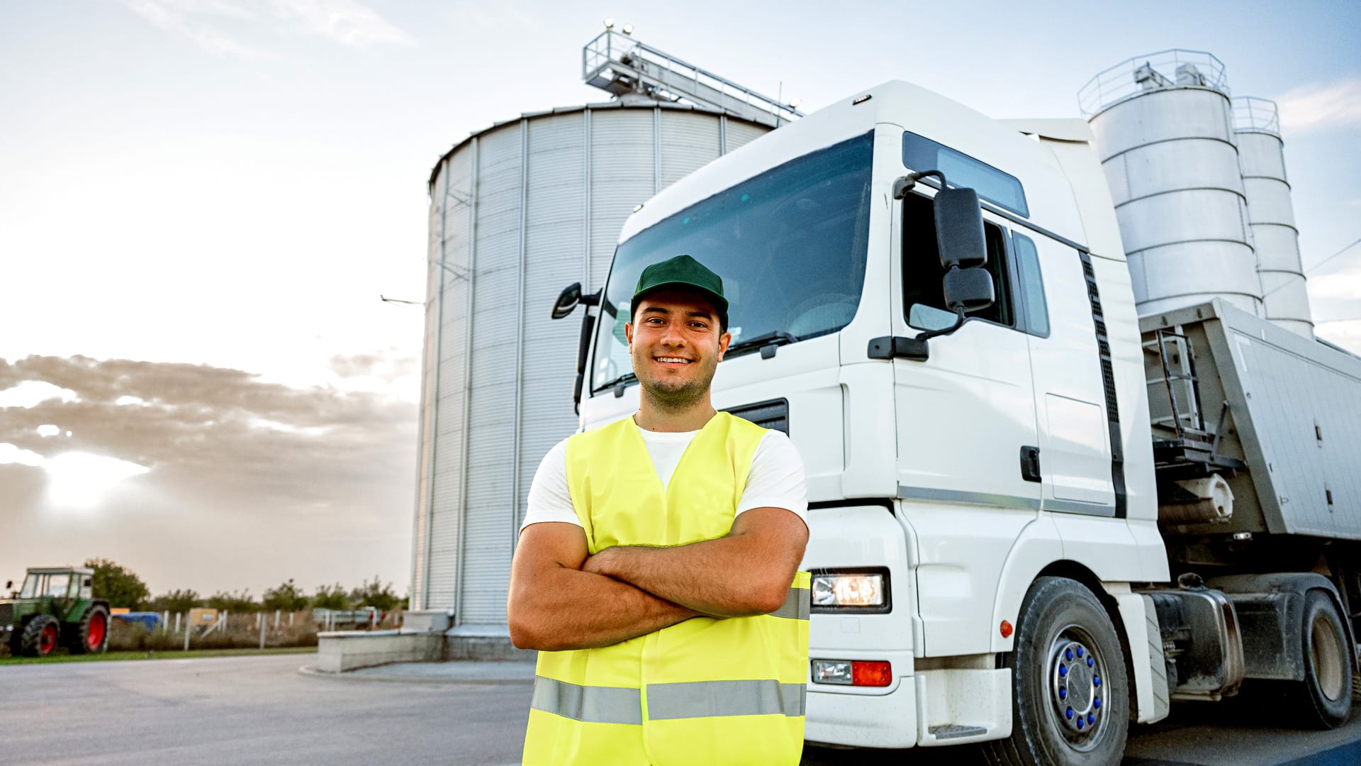 Man standing in front of his truck