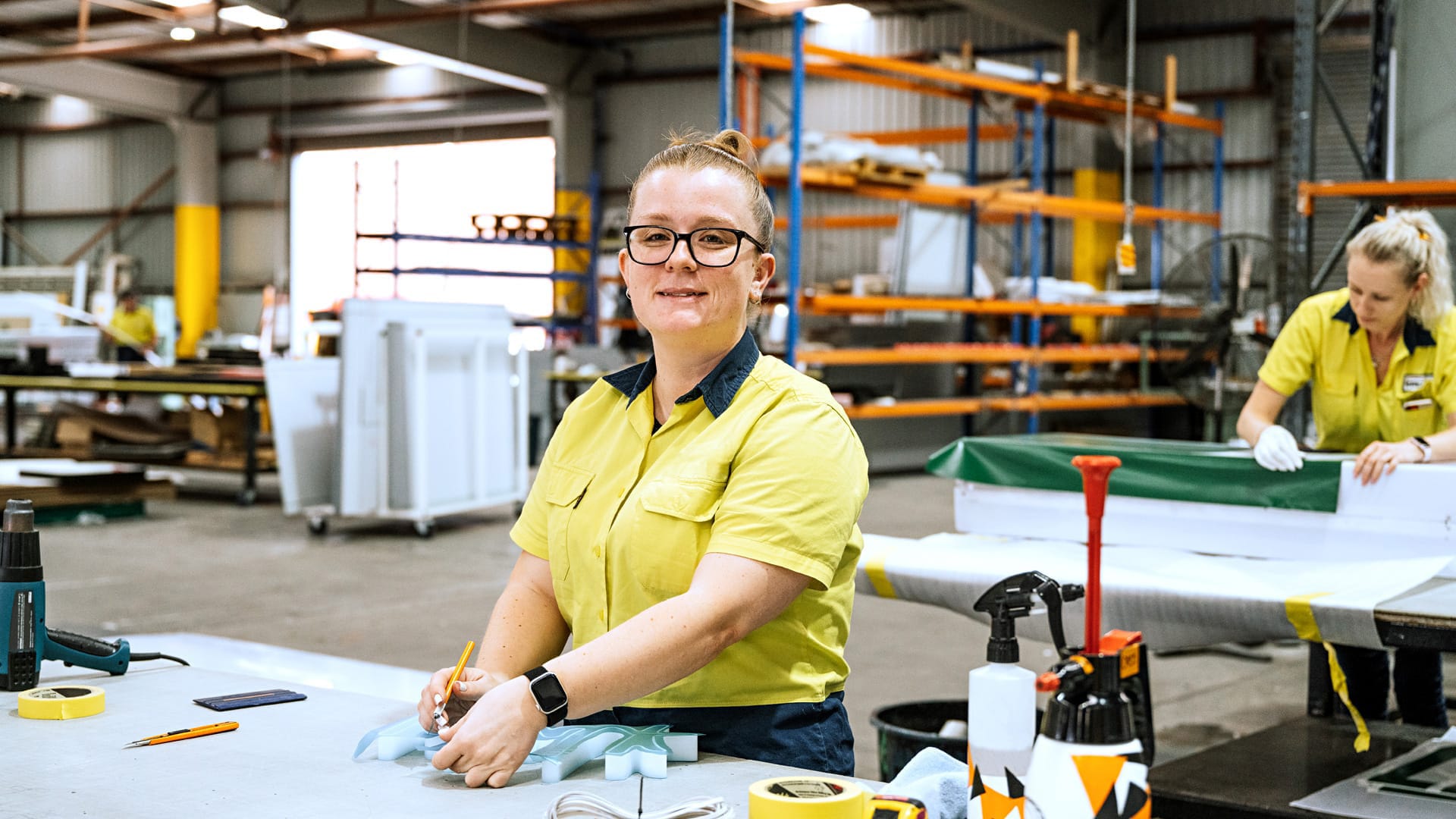 2 Woman working in factory
