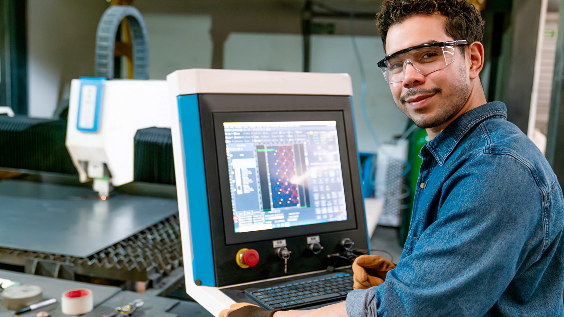 Person on metal laser cutting machine