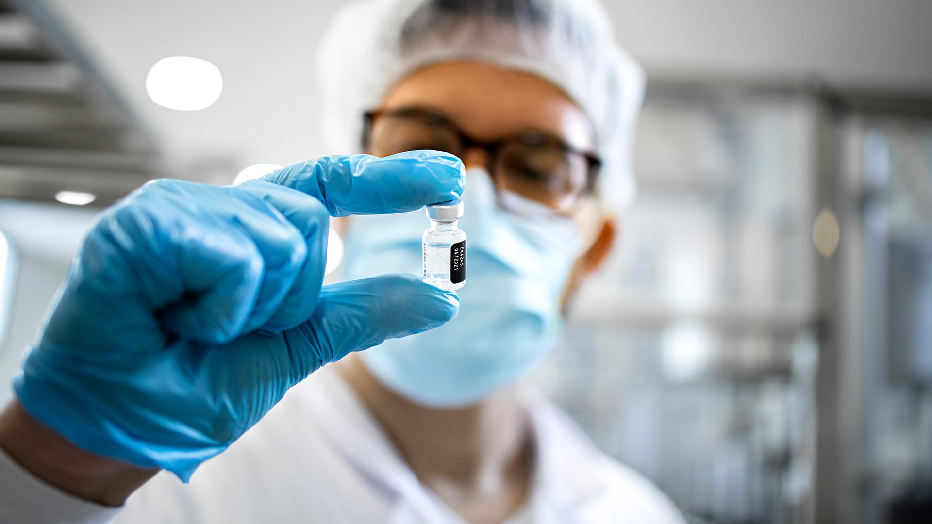 Lab technician checking medicine