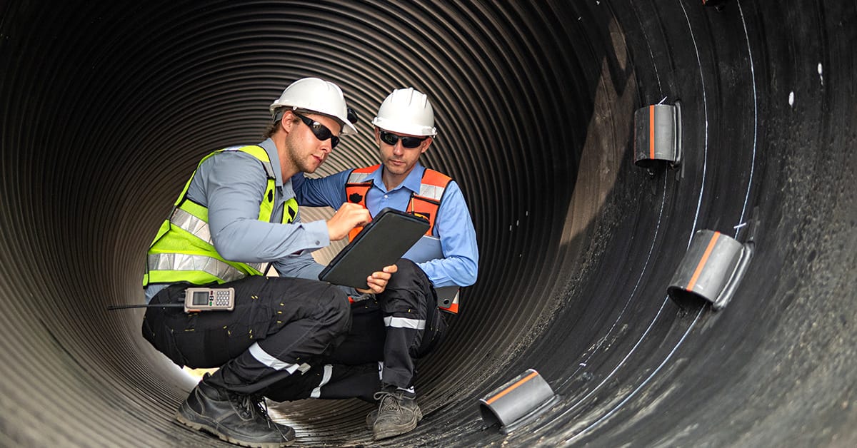 Two consultants discussing infrastructure.