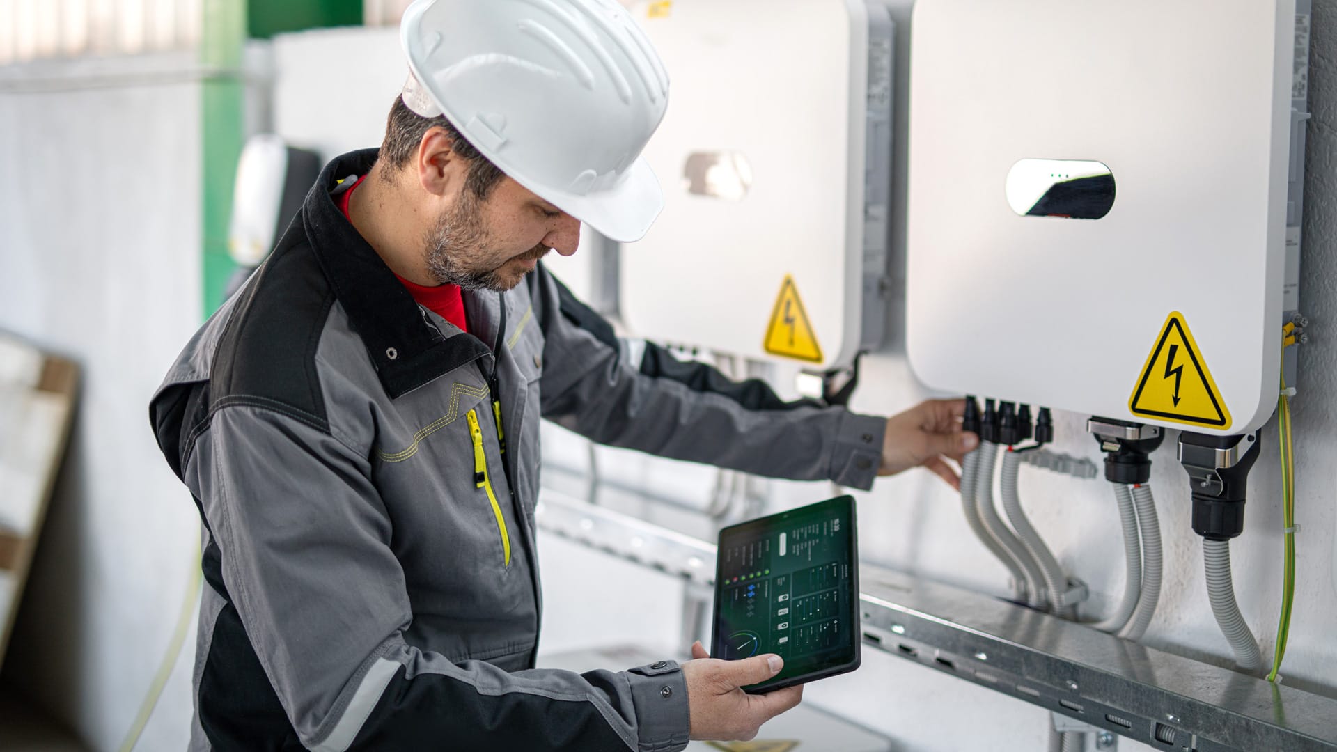 Man maintaining Electric Battery