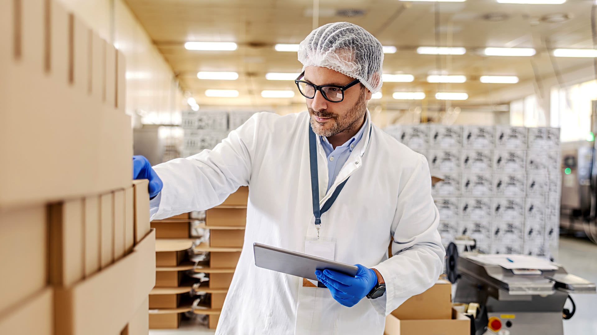 Man inspecting manufacturing batch