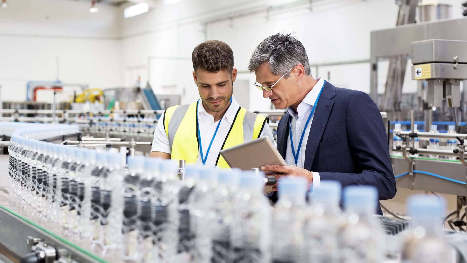 Owner with employee understaning process