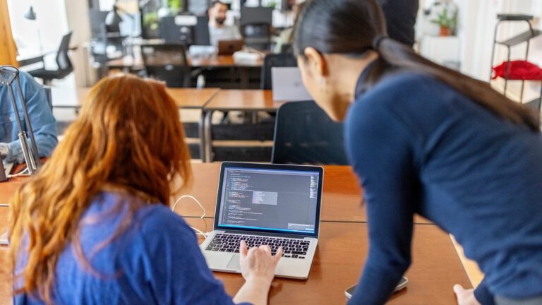 Employees using computer data & AI